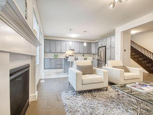 385 Gordon Krantz Ave, Milton, ON - Indoor Photo Showing Living Room With Fireplace