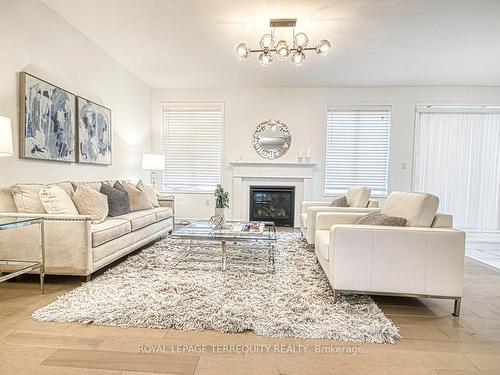 385 Gordon Krantz Ave, Milton, ON - Indoor Photo Showing Living Room With Fireplace