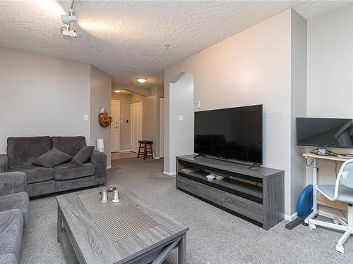 109-935 Johnson St, Victoria, BC - Indoor Photo Showing Living Room