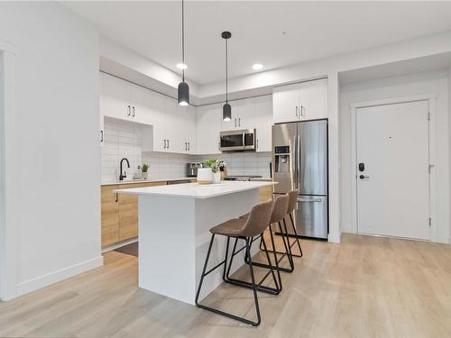 111-2465 Gateway Rd, Langford, BC - Indoor Photo Showing Kitchen With Stainless Steel Kitchen With Upgraded Kitchen