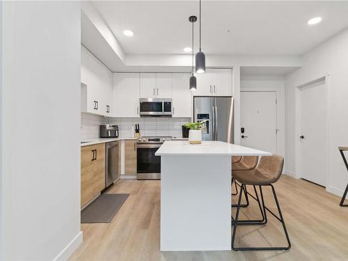 111-2465 Gateway Rd, Langford, BC - Indoor Photo Showing Kitchen With Stainless Steel Kitchen With Upgraded Kitchen