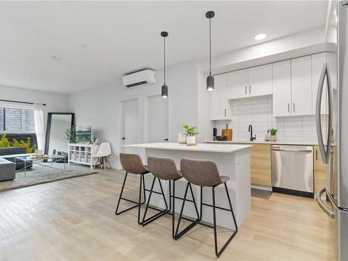 111-2465 Gateway Rd, Langford, BC - Indoor Photo Showing Kitchen With Stainless Steel Kitchen With Upgraded Kitchen