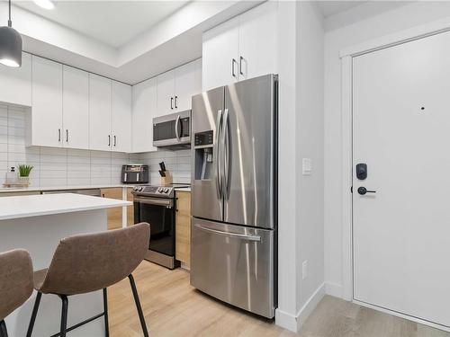 111-2465 Gateway Rd, Langford, BC - Indoor Photo Showing Kitchen With Stainless Steel Kitchen