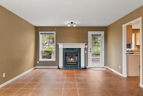 3281 Juniper Drive, Naramata, BC - Indoor Photo Showing Living Room With Fireplace