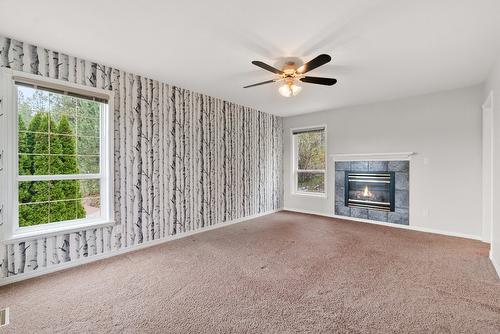 3281 Juniper Drive, Naramata, BC - Indoor Photo Showing Living Room With Fireplace