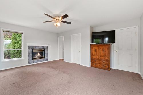 3281 Juniper Drive, Naramata, BC - Indoor Photo Showing Living Room With Fireplace