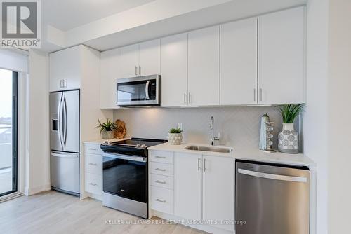 407 - 3200 William Coltson Avenue, Oakville, ON - Indoor Photo Showing Kitchen With Stainless Steel Kitchen