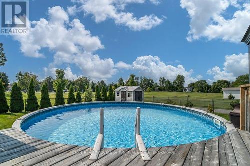 78 Beverly Street, Greater Napanee, ON - Outdoor With Above Ground Pool With Deck Patio Veranda With Backyard