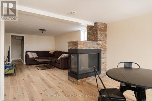 569 River Road S, Peterborough (Ashburnham), ON - Indoor With Fireplace