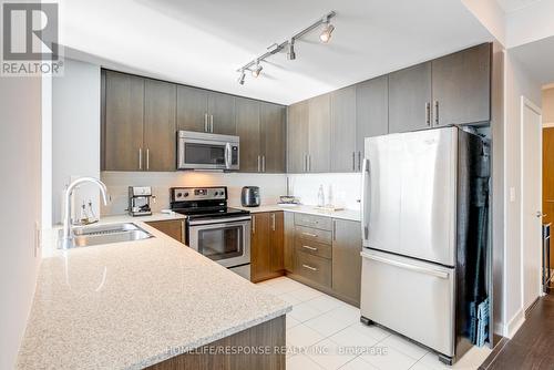 305 - 3985 Grand Park Drive, Mississauga, ON - Indoor Photo Showing Kitchen With Stainless Steel Kitchen With Double Sink