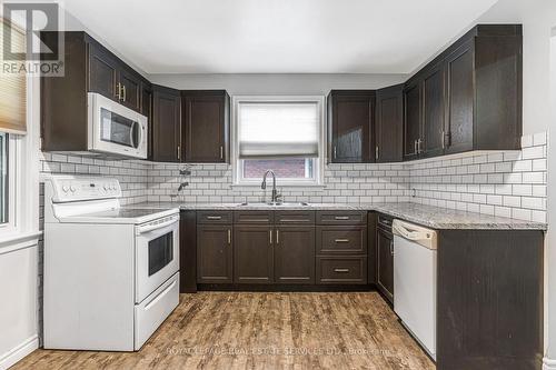 21 Chalmers Street, St. Catharines, ON - Indoor Photo Showing Kitchen With Double Sink