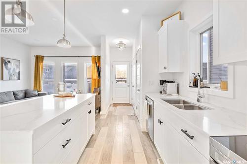 526 Brighton Gate, Saskatoon, SK - Indoor Photo Showing Kitchen With Double Sink