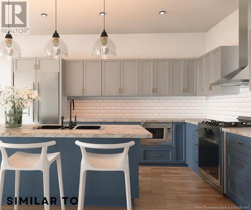 A3 White Pines Court, Hampton, NB - Indoor Photo Showing Kitchen With Upgraded Kitchen