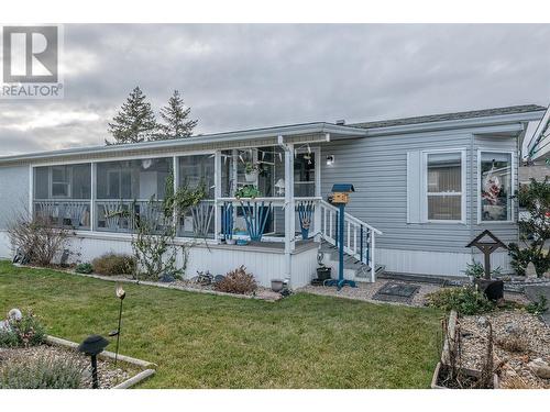 Side yard - check out the great covered porch! - 5484 25 Avenue Unit# 38, Vernon, BC 