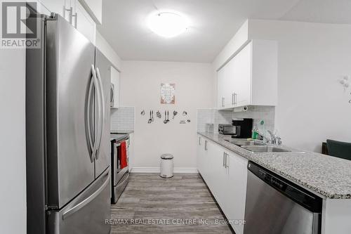 1704 - 310 Burnhamthorpe Road W, Mississauga, ON - Indoor Photo Showing Kitchen With Stainless Steel Kitchen With Double Sink