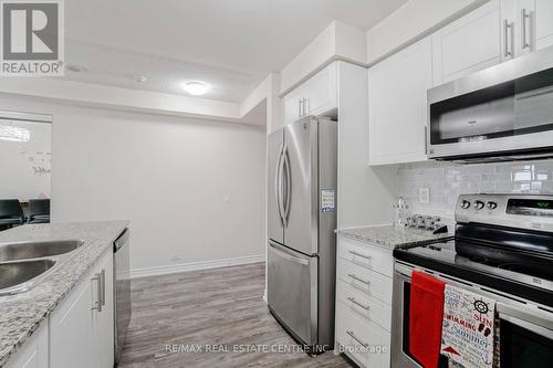 1704 - 310 Burnhamthorpe Road W, Mississauga, ON - Indoor Photo Showing Kitchen With Double Sink