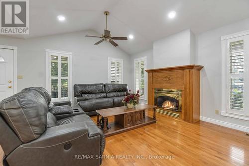 49 Argyle Street, Lambton Shores (Forest), ON - Indoor Photo Showing Living Room With Fireplace