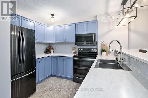 121 - 55 Trott Boulevard, Collingwood, ON - Indoor Photo Showing Kitchen With Double Sink