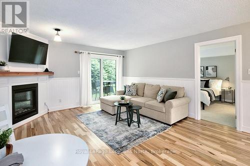 121 - 55 Trott Boulevard, Collingwood, ON - Indoor Photo Showing Living Room With Fireplace