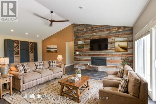 7761 Mcarthur Side Road, Ramara, ON - Indoor Photo Showing Living Room With Fireplace