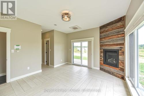 7761 Mcarthur Side Road, Ramara, ON - Indoor With Fireplace