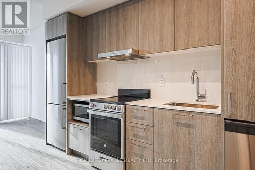 305 - 195 Commerce Street, Vaughan, ON - Indoor Photo Showing Kitchen