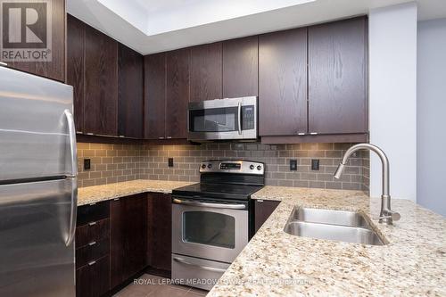 125 - 570 Lolita Gardens, Mississauga, ON - Indoor Photo Showing Kitchen With Double Sink With Upgraded Kitchen