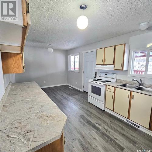 1205 17Th Street W, Prince Albert, SK - Indoor Photo Showing Kitchen With Double Sink