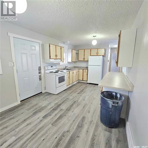 1205 17Th Street W, Prince Albert, SK - Indoor Photo Showing Kitchen With Double Sink