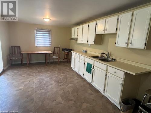 1250 Derland Road, Corbeil, ON - Indoor Photo Showing Kitchen With Double Sink