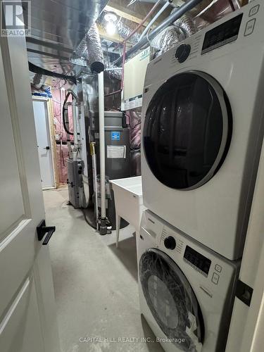 77 Chelliah Court, Toronto, ON - Indoor Photo Showing Laundry Room