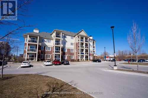 315 - 80 Aspen Springs Drive, Clarington, ON - Outdoor With Facade