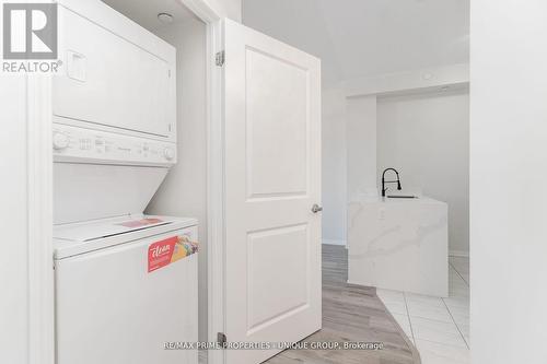 315 - 80 Aspen Springs Drive, Clarington, ON - Indoor Photo Showing Laundry Room