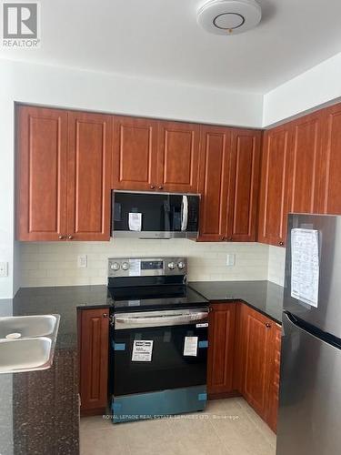 3210 - 225 Webb Drive, Mississauga, ON - Indoor Photo Showing Kitchen With Stainless Steel Kitchen With Double Sink