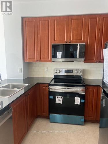 3210 - 225 Webb Drive, Mississauga, ON - Indoor Photo Showing Kitchen With Double Sink