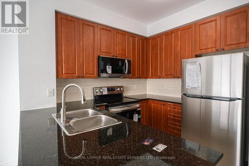 3210 - 225 Webb Drive, Mississauga, ON - Indoor Photo Showing Kitchen With Stainless Steel Kitchen With Double Sink