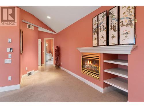 765 Westpoint Drive, Kelowna, BC - Indoor Photo Showing Other Room With Fireplace