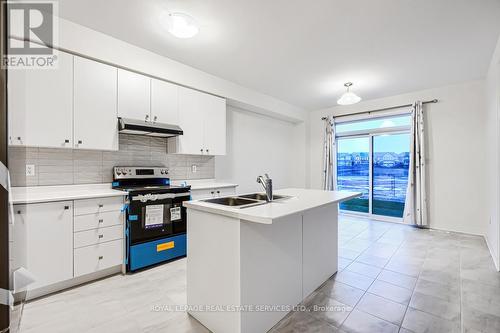 126 Port Crescent, Welland, ON - Indoor Photo Showing Kitchen With Double Sink