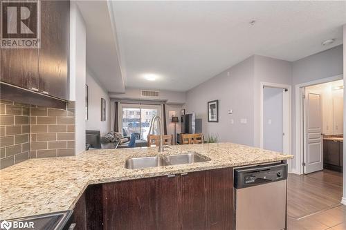 570 Lolita Gardens Unit# 125, Mississauga, ON - Indoor Photo Showing Kitchen With Double Sink