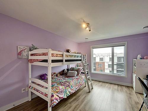 Chambre Ã Â coucher - 407-10080 Rue De L'Épervier, Mirabel, QC - Indoor Photo Showing Bedroom