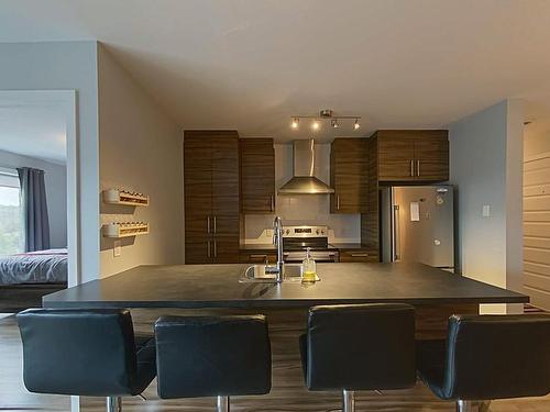 Cuisine - 407-10080 Rue De L'Épervier, Mirabel, QC - Indoor Photo Showing Kitchen With Double Sink