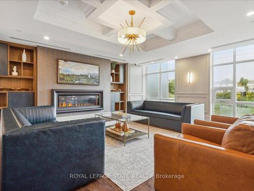 815-460 Dundas St E, Hamilton, ON - Indoor Photo Showing Living Room With Fireplace