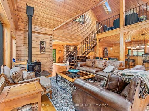 142 Paddy'S Lane, Westport, ON - Indoor Photo Showing Living Room With Fireplace