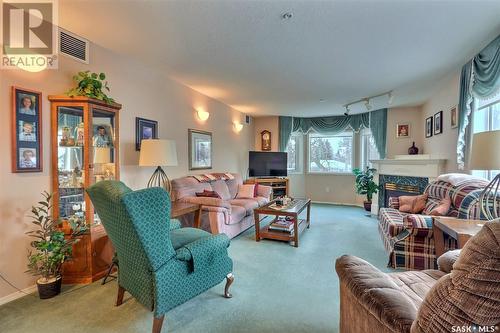 203 544 River Street E, Prince Albert, SK - Indoor Photo Showing Living Room With Fireplace