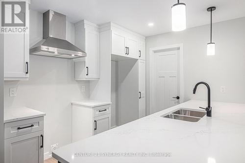 76 Villeneuve Street, North Stormont, ON - Indoor Photo Showing Kitchen With Double Sink