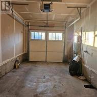 Garage featuring a garage door opener - 