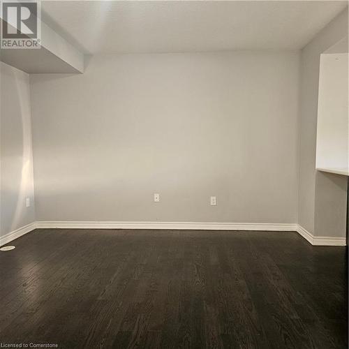 Unfurnished room with dark hardwood / wood-style floors - 39 Appleby Street, Kitchener, ON - Indoor Photo Showing Other Room