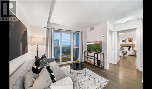 3208 - 125 Village Green Square, Toronto, ON - Indoor Photo Showing Living Room