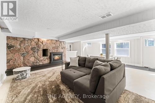 15 32Nd Street S, Wasaga Beach, ON - Indoor Photo Showing Living Room With Fireplace