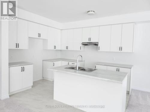 11 Prest Way, Centre Wellington, ON - Indoor Photo Showing Kitchen With Double Sink